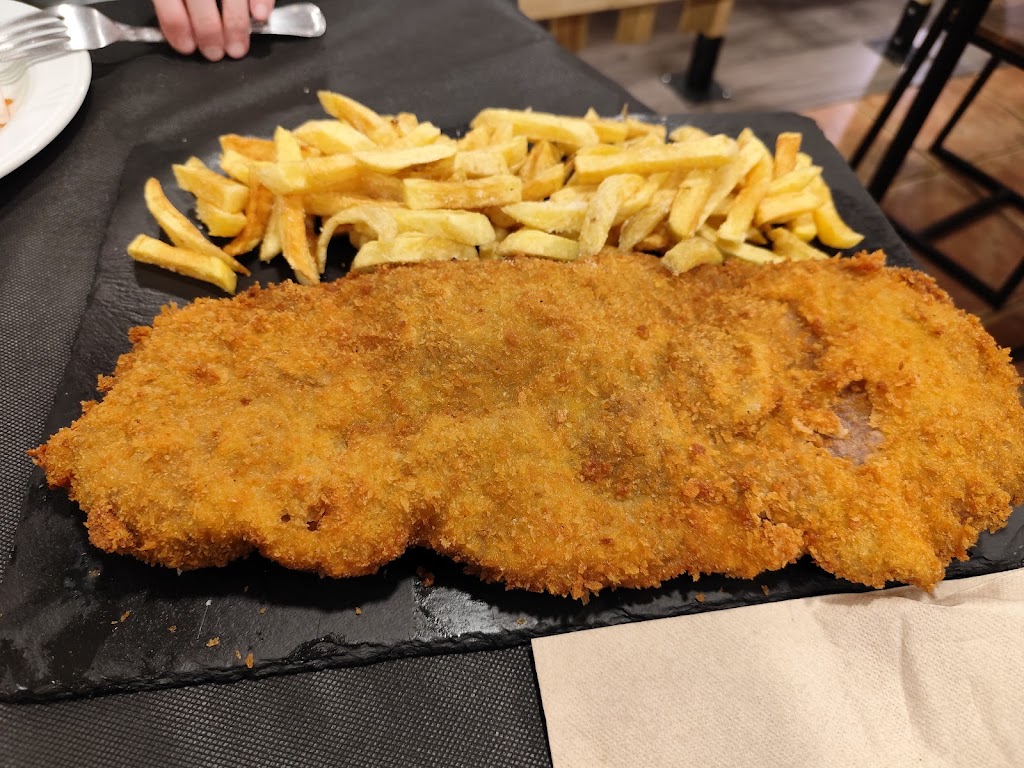 La Rebollada (Tapia), A Caridá